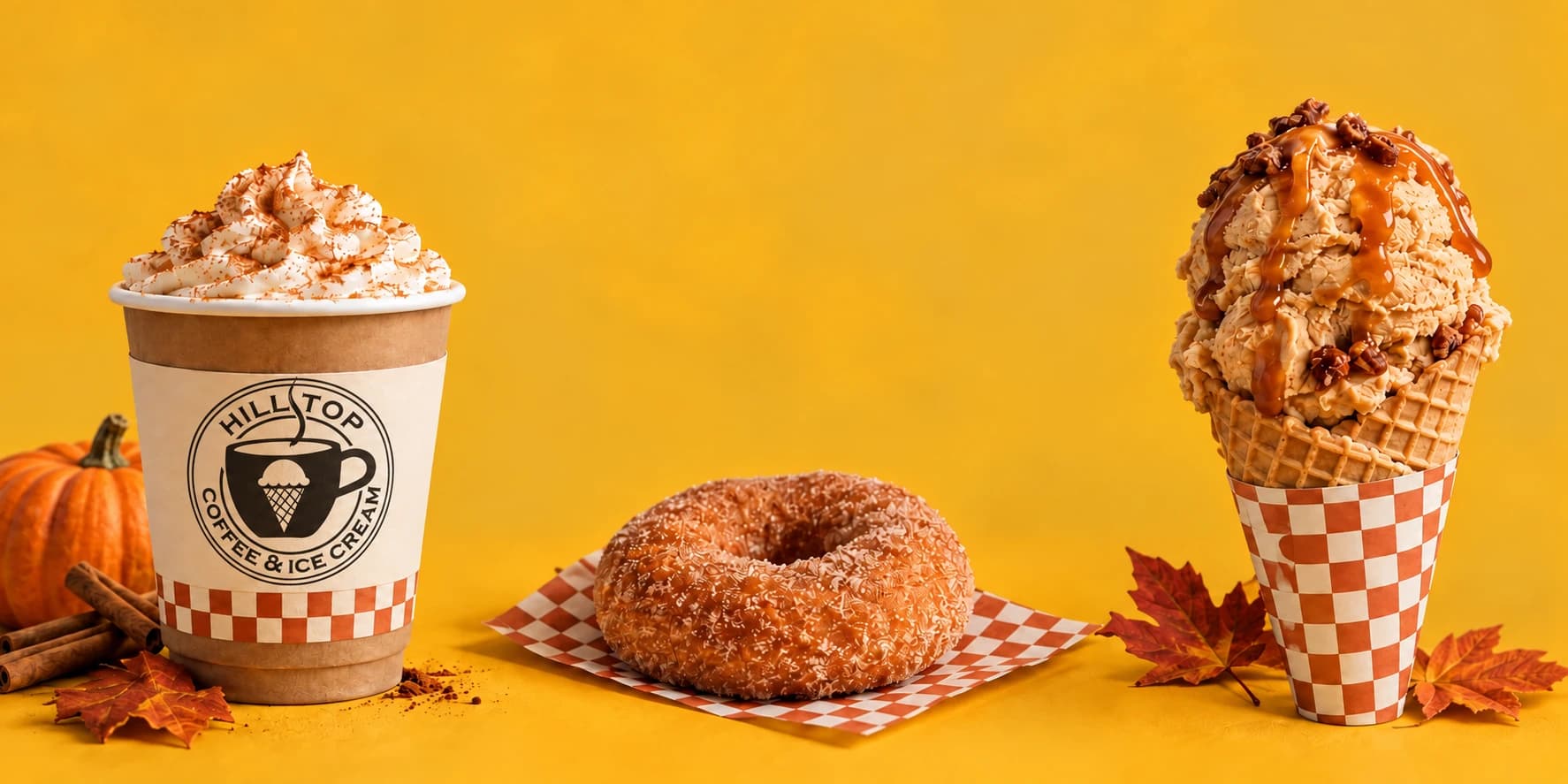 Coffee, a cinnamon sugar donut, and caramel ice cream surrounded by autumn leaves